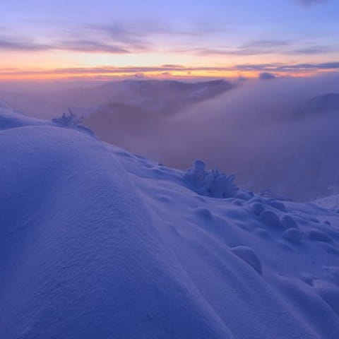 Sonnenuntergangswanderung mit Schneeschuhen auf dem Hohneck